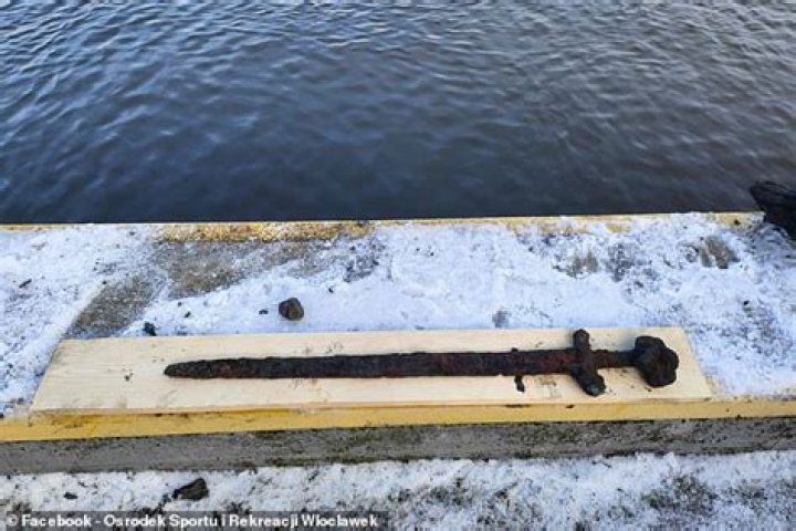 1,100-Year-Old Viking Sword Pulled From River By Magnet Fisher