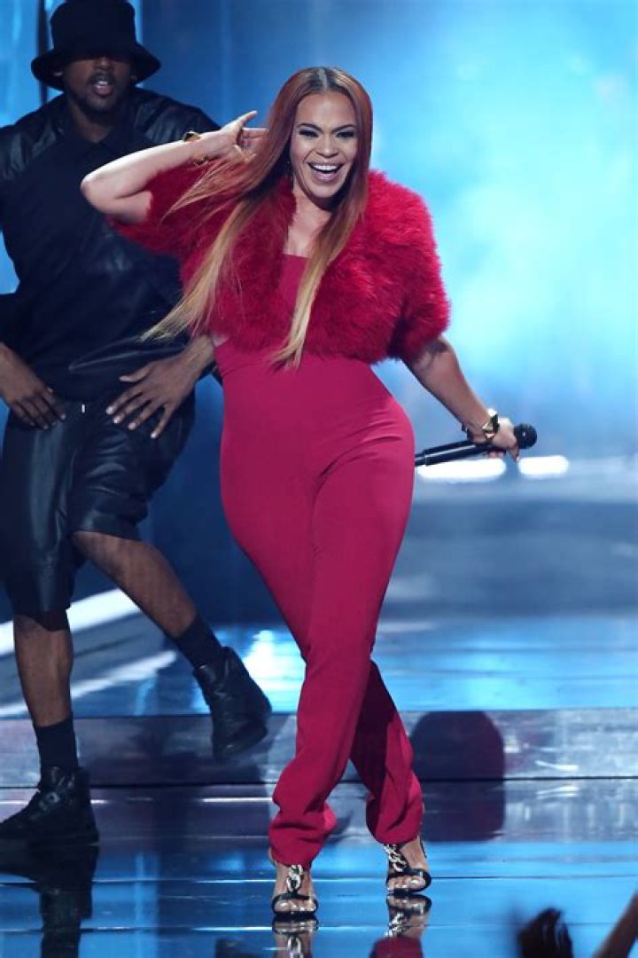 How tall is Faith Evans